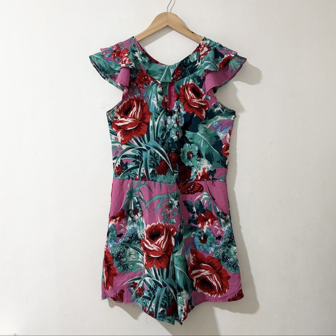 [S/M] Floral Ruffled Keyhole Romper Playsuit (Category: Rompers) located in Tanza. Submitted by shop_qrated (Listing ID 1460896943, Image 1). Description: Floral Ruffled Keyhole Romper Playsuit. Fits S/M frames. Flaw: may tastas, see photo. Still good condition. With back zip..
