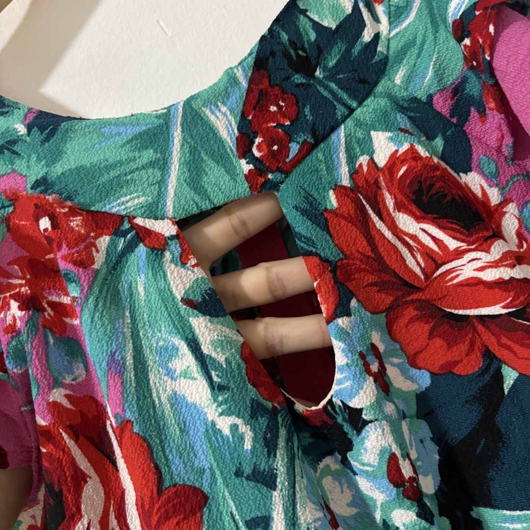[S/M] Floral Ruffled Keyhole Romper Playsuit (Category: Rompers) located in Tanza. Submitted by shop_qrated (Listing ID 1460896943, Image 3). Description: Floral Ruffled Keyhole Romper Playsuit. Fits S/M frames. Flaw: may tastas, see photo. Still good condition. With back zip..