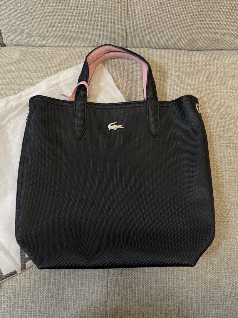 SMALL HANDBAG (Category: Tote Bags) located in Manila. Submitted by declutter.with.vi (Listing ID 1460787157, Image 1). Description: Comes with a strap Comes with wallet With dustbag and plastic bag Got it from Vietnam.
