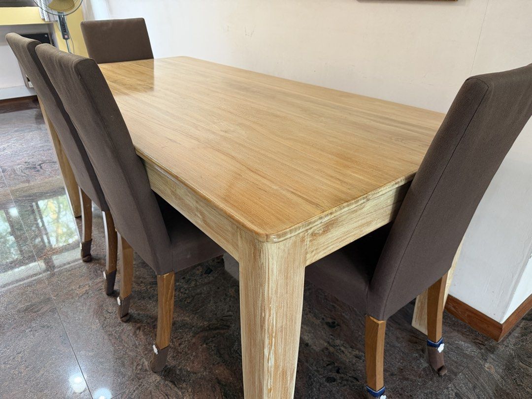 Solid wooden table (Category: Tables & Sets) located in Singapore. Submitted by junwei12321 (Listing ID 1460746367, Image 2). Description: Solid wooden dining table. Comes with 6 chair free. Length 180cm Breadth 84cm Height 76cm.