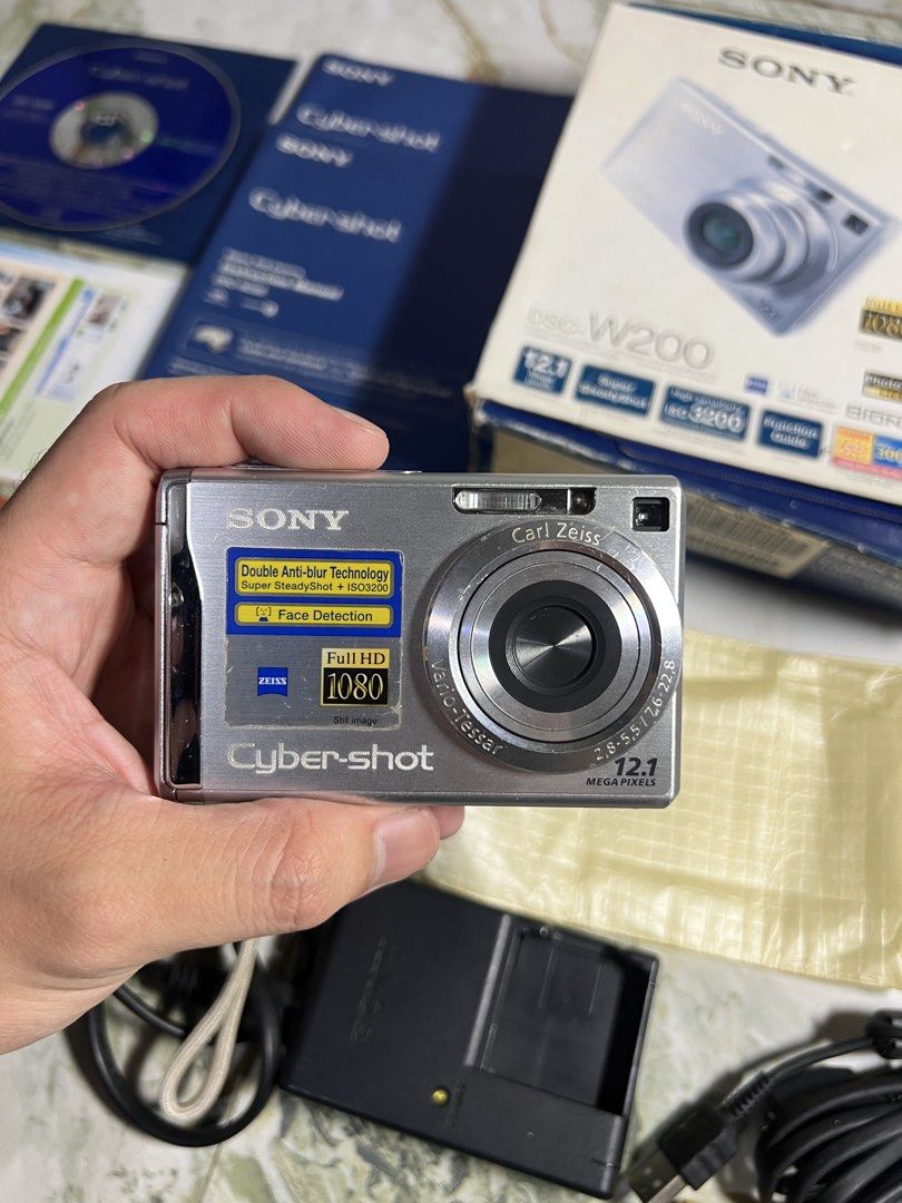 *Sony DSC-W200 - 12.1 MP (Category: Cameras) located in Subic. Submitted by thrifters_23 (Listing ID 1460865215, Image 2). Description: *Sony DSC-W200 - 12.1 MP Condition: - pre-owned - tested & working - clean output - visible dirt & scratches on lcd (doesn’t affect the output) - no functional issues Body: - 7.5/10 (few signs of usage) Inclusion: (complete) - unit - 2 battery - 8 gb memory card - strap - og box - pouch - manuals - memory stick d