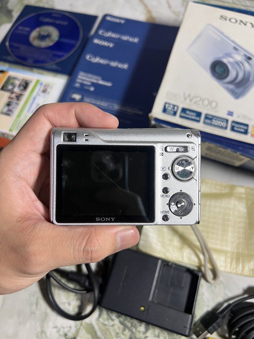 *Sony DSC-W200 - 12.1 MP (Category: Cameras) located in Subic. Submitted by thrifters_23 (Listing ID 1460865215, Image 3). Description: *Sony DSC-W200 - 12.1 MP Condition: - pre-owned - tested & working - clean output - visible dirt & scratches on lcd (doesn’t affect the output) - no functional issues Body: - 7.5/10 (few signs of usage) Inclusion: (complete) - unit - 2 battery - 8 gb memory card - strap - og box - pouch - manuals - memory stick d