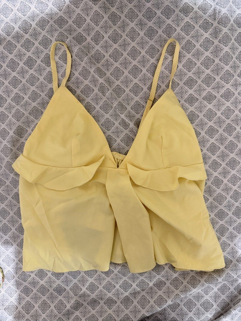 Spaghetti Strap Ruffled Backless Loose Sweet Yellow Cami Top for Summer (Category: Sleeveless) located in Manila. Submitted by ynasbr (Listing ID 1460869813, Image 1). Description: .