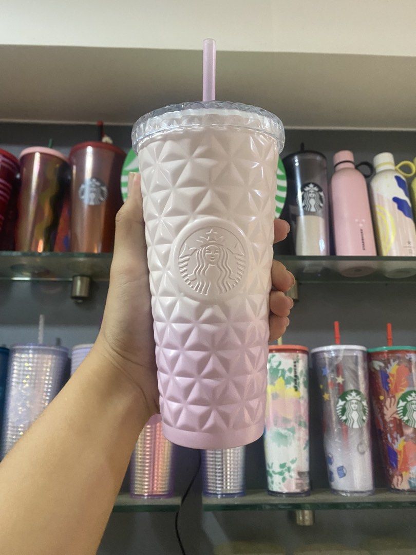 ST-20OZ SS GRADIENT PINK DIAMOND W/HEART COLD CUF (Category: Water Bottles & Tumblers) located in Paranaque City. Submitted by jayisnottyfound (Listing ID 1460755158, Image 1). Description: - Brand: Starbucks - Type: Cold Cup Tumbler - Size: 20oz - Material: Stainless Steel - Design: Pink gradient with diamond-like texture - Features: Comes with a matching straw - Condition: Brand new.