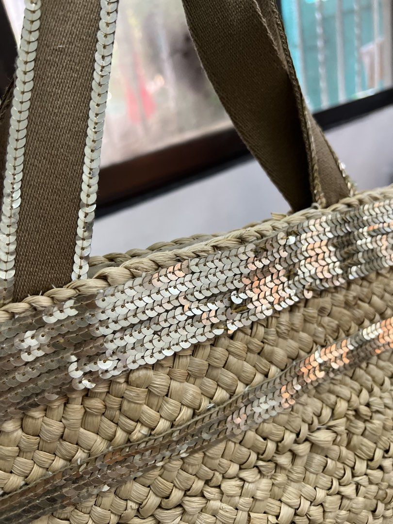 Straw Tote Bag with Sequins (Category: Tote Bags) located in Quezon City. Submitted by happyshop31 (Listing ID 1460726617, Image 2). Description: - Cute straw tote bag with sparkly sequin details - Ideal for beach days or casual outings - Spacious enough to carry your essentials - Made from natural woven material.