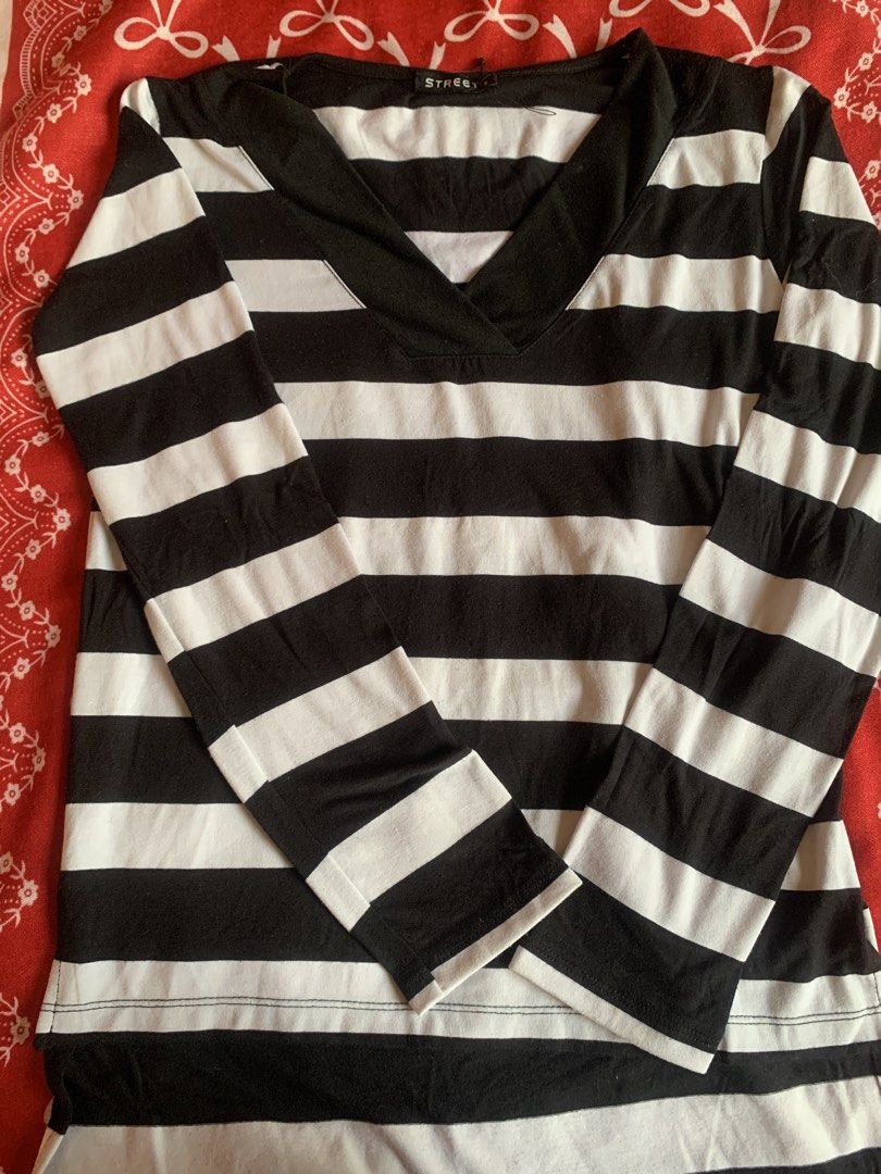 STREET Black Striped Long Sleeves (Category: Longsleeves) located in Navotas City. Submitted by elaitems (Listing ID 1460803509, Image 1). Description: - Dimensions: • width: 23 inches • length: 27 inches •Adults: S - XL - Negotiable price - PRELOVED! NO issues or stain - STREET Black long sleeves (V-neck) .