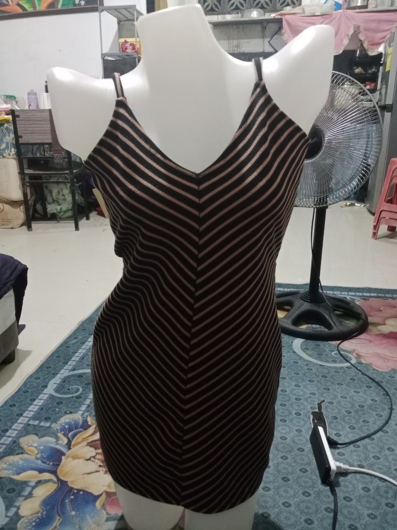 Striped Mini Dress with Matching Blazer Set (Category: Dresses) located in Marilao. Submitted by grace-frugalfoodieph (Listing ID 1460745438, Image 2). Description: - Two-piece set: V-neck mini dress and double-breasted blazer - Classic black and tan diagonal stripe pattern - Dress features thin spaghetti straps and a cinched waist - Blazer has button closures and pocket details - Versatile for night outs or stylish daytime looks.