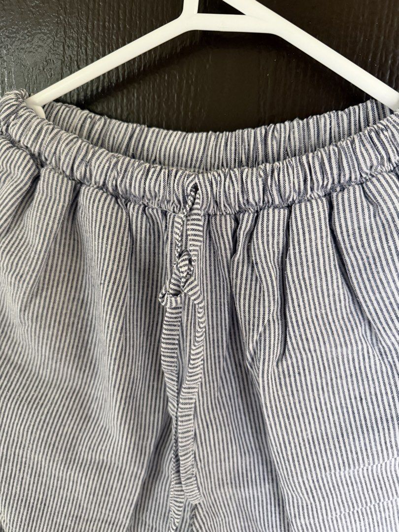 Striped Wide Leg Pants with Drawstring Waist (Category: Other Bottoms) located in Paranaque City. Submitted by shopnrepeat_ (Listing ID 1460819101, Image 3). Description: free size best fit 26"-28" length 37" - Light blue and white striped pattern - Wide leg cut for a relaxed fit - Comfortable elastic waistband with drawstring tie - Convenient side pockets - Versatile for lounging, errands, or casual wear - Easy to pair with any top.