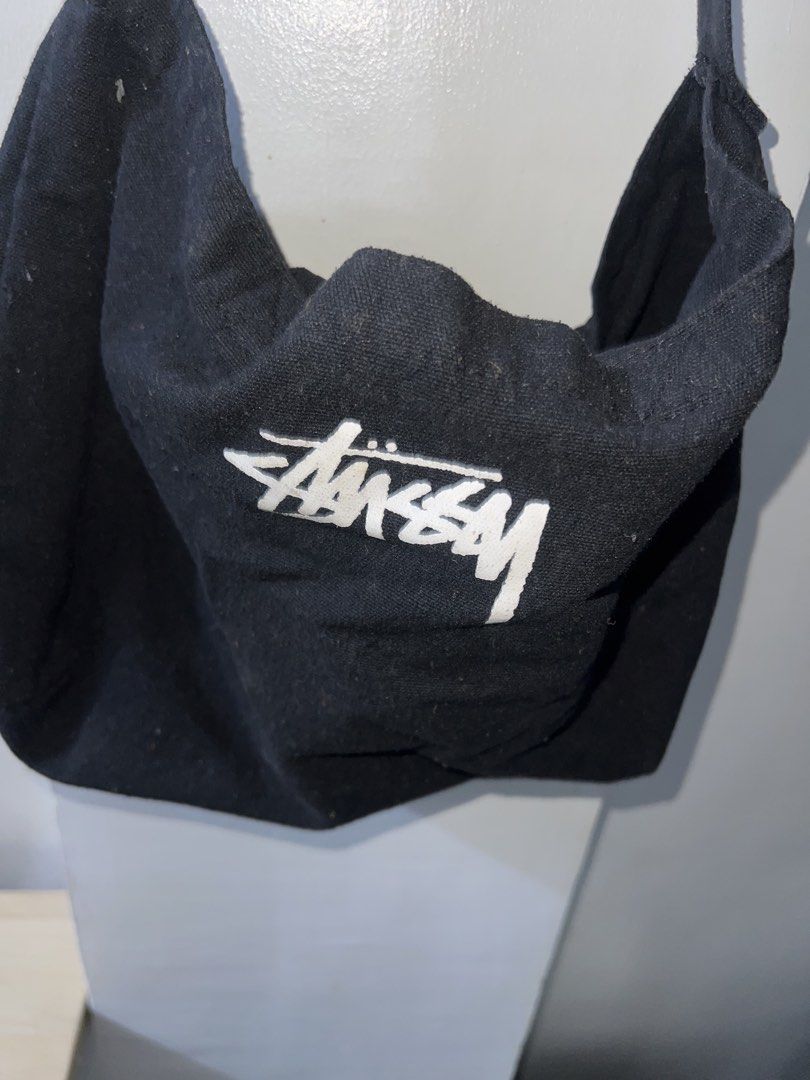 Stussy Black Shoulder Bag (Category: Shoulder Bags) located in Manila. Submitted by asa68984 (Listing ID 1460881438, Image 2). Description: - Classic black Stussy shoulder bag - Simple and timeless design - Ample space for everyday essentials - Prominent Stussy logo on the front - Perfect for casual outings and daily use.