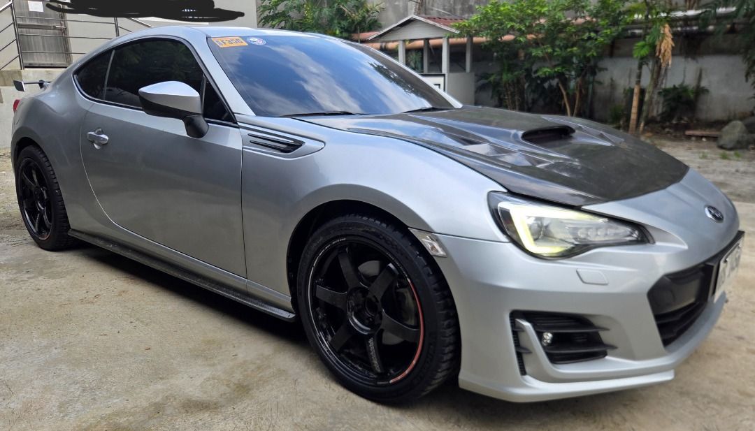Subaru BRZ 2.0 (A) (Category: Used Cars) located in Caloocan City. Submitted by jstnrgr (Listing ID 1460853389, Image 1). Description: Ultra low mileage. 17k odo only para sa 2019 acquired unit. Legit sunday car. Garage Queen. Upgrades. Volk Rays TE37 Time attack Mags Michelin tires 2025 lang super fresh. Carbon hood. Sideskirts and tail Kenwood head unit No issue. Usual wear only..