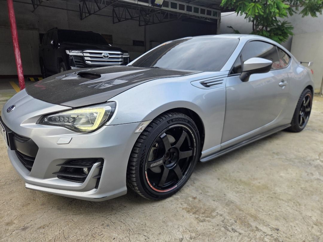 Subaru BRZ 2.0 (A) (Category: Used Cars) located in Caloocan City. Submitted by jstnrgr (Listing ID 1460853389, Image 2). Description: Ultra low mileage. 17k odo only para sa 2019 acquired unit. Legit sunday car. Garage Queen. Upgrades. Volk Rays TE37 Time attack Mags Michelin tires 2025 lang super fresh. Carbon hood. Sideskirts and tail Kenwood head unit No issue. Usual wear only..