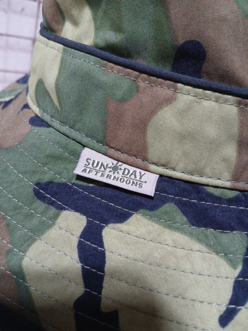 Sunday Afternoons Camo Bucket Hat (Category: Caps & Hats) located in La Trinidad. Submitted by dashopperist (Listing ID 1460768327, Image 3). Description: - Brand: Sunday Afternoons - Style: Camo Bucket Hat - Size: Medium - Features: Mesh panels for ventilation - Ideal for: Outdoor activities, casual wear.