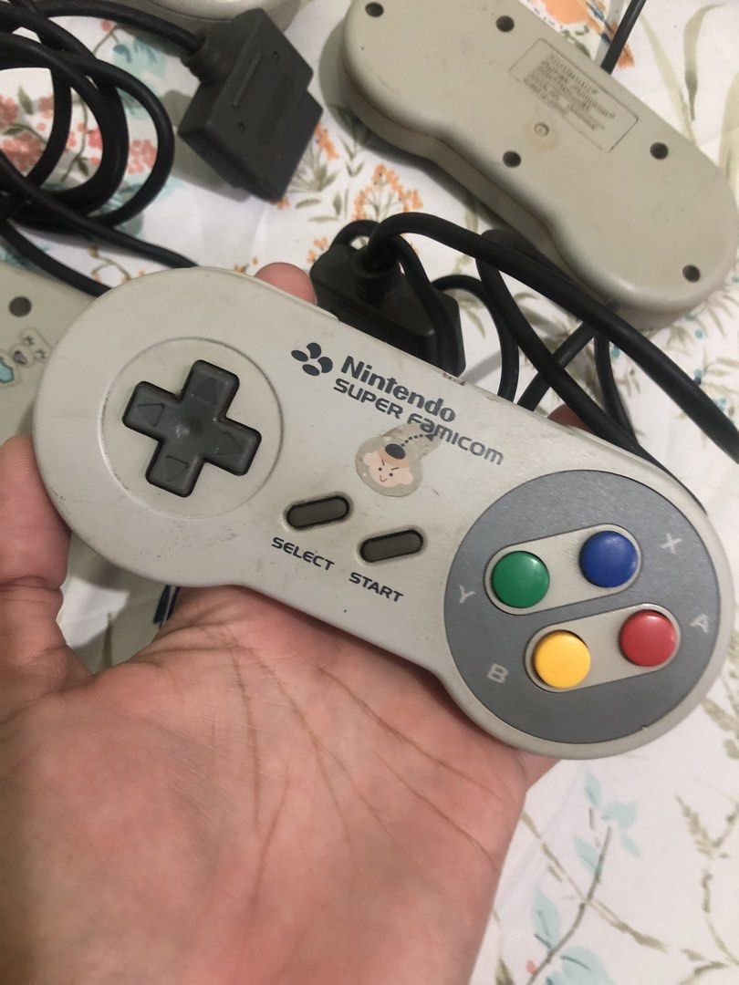 Super Famicom Controllers Set bundle (Category: Controllers) located in Quezon City. Submitted by markgolveo (Listing ID 1460745808, Image 3). Description: Super Famicom Controllers Set bundle No set breaking Untested units 1Pc as shown missing start button rubber For parts out.