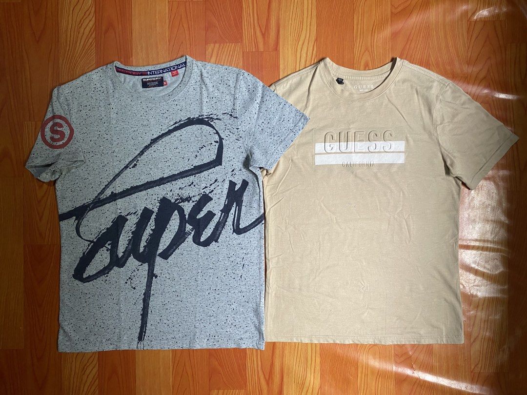 Superdry & Guess shirt (Category: Tshirts & Polo Shirts ) located in Cebu City. Submitted by monflor (Listing ID 1460899413, Image 1). Description: Superdry shirt & guess shirt Size Medium both Good condition No flaws Price each 500.
