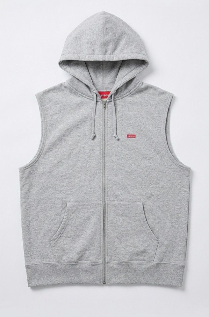 SUPREME HOODIE VEST (Category: Luxury Apparel) located in Manila. Submitted by swiftocean_2688ba (Listing ID 1460917458, Image 1). Description: Supreme Small Box Logo Zip-Up Hooded Vest in Heather Grey. Product Details Release: Archival piece from the iconic Fall/Winter 2014 collection. Design: Sleeveless fleece gilet construction featuring a full-zip front, drawstring hood, and classic split kangaroo pockets. Branding: Micro red Supreme box logo