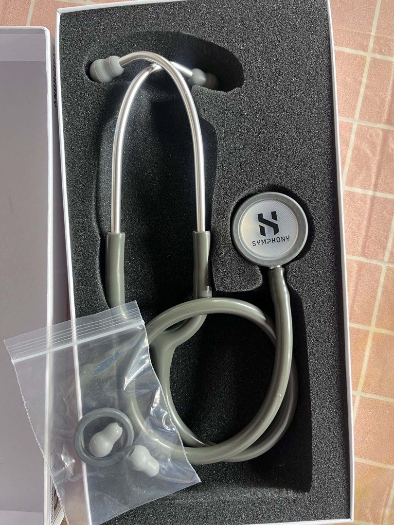 Symphony Stethoscope Grey - Medical Equipment (Category: Medical Supplies & Tools) located in Manila. Submitted by winedinesixtynine (Listing ID 1460723165, Image 1). Description: - Symphony stethoscope in grey - Comes in original packaging - Includes extra ear tips - Ideal for medical professionals and students - High-quality acoustic design for clear sound - Ready for its new owner.