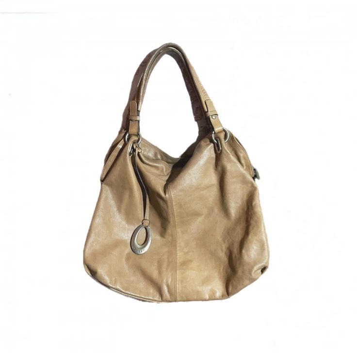 Tan Leather Hobo Shoulder Bag (Category: Shoulder Bags) located in Pasig City. Submitted by shanbingsu (Listing ID 1460753798, Image 1). Description: thrifted for 600+ — has sign of usage dm for more pics!.