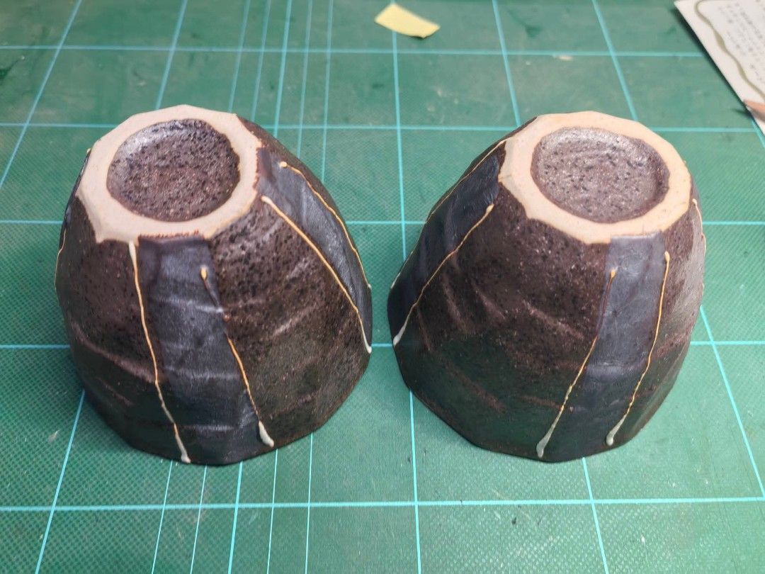 Teacups Pair (Category: Coffee & Tea Tableware) located in Cebu City. Submitted by dudes_villanueva (Listing ID 1460715985, Image 3). Description: Teacups Dark Ceramic Stoneware Set of 2 In excellent condition — no cracks or chips Size: 3.5in diameter x 3in height 📌 handmade 📌 textured surface 📌 vertical white glazed accents.
