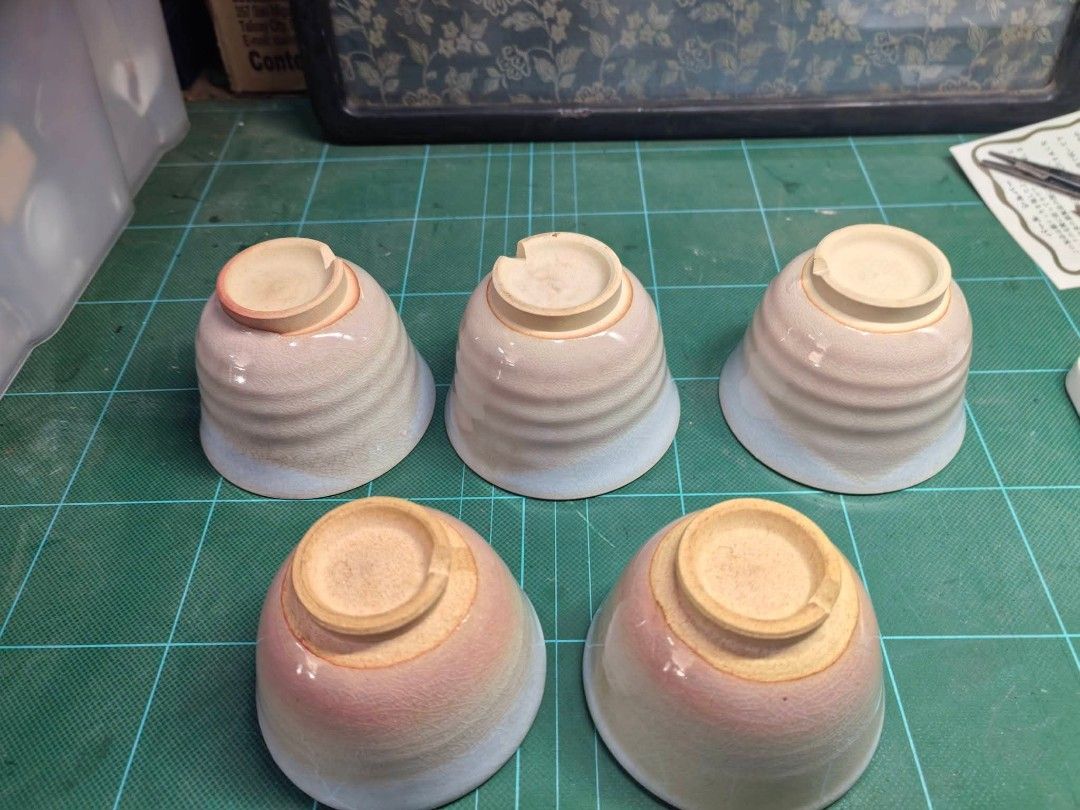 Teacups Set of 5 (Category: Coffee & Tea Tableware) located in Cebu City. Submitted by dudes_villanueva (Listing ID 1460715486, Image 1). Description: 5pcs Ceramic Hagi ware (Hagi-yaki) Teacups In excellent condition — ni cracks or chips 📌 Upper Body: A muted, pale blue-gray or celadon-tinted glaze covered with fine crackle patterns (crazing). 📌 Lower Body: A delicate fade into a soft rosy-pink or peach hue near the base. 📌 Foot (Exposed Base)