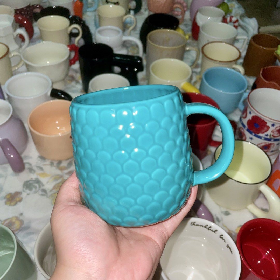 Teal Textured Ceramic Mug (Category: Coffee & Tea Tableware) located in Valenzuela. Submitted by baekhyunie_pau (Listing ID 1460810292, Image 1). Description: Cool teal mug with honeycomb texture. Perfect for coffee or tea, with a sturdy handle. Nice size for a good cuppa..