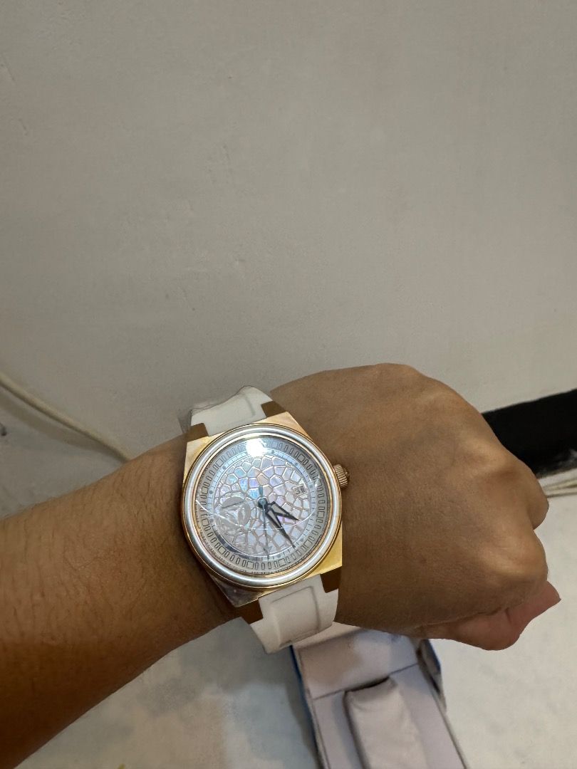 TechnoMarine Watch Rose Gold White Strap (Category: Women's Watches) located in Manila. Submitted by janinbula (Listing ID 1460911641, Image 1). Description: - Brand new TechnoMarine watch - Elegant rose gold casing - Crisp white strap - Unique patterned dial for a distinctive look - Includes original box and tags - Never worn, protective plastic still attached.