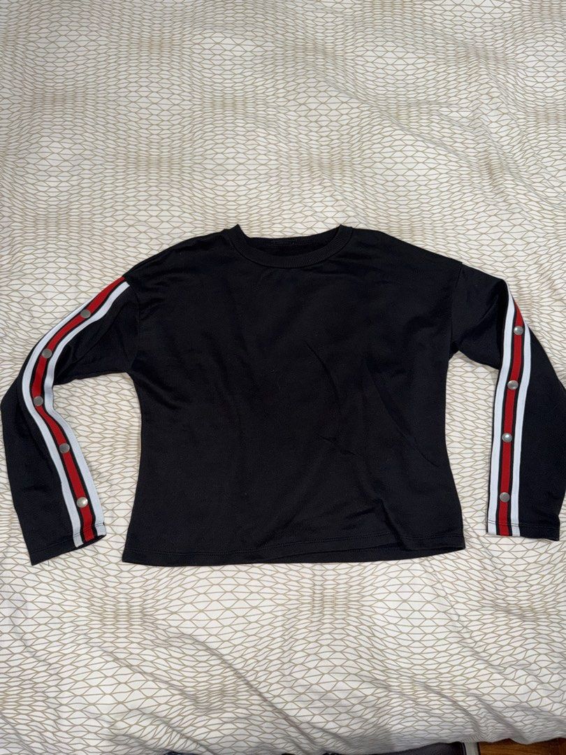 Terranova Black Long Sleeve Top with Snap Button Sleeves (Category: Longsleeves) located in Mandaluyong City. Submitted by kqloset (Listing ID 1460820074, Image 1). Description: - Brand: Terranova - Color: Black - Style: Long-sleeved top - Details: Red and white stripe detail on sleeves, snap buttons on sleeves - Occasion: Casual, everyday wear - Features: Stylish and comfortable.