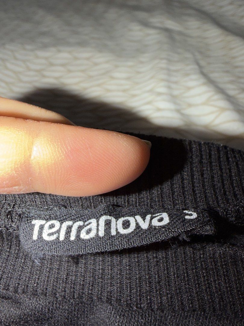 Terranova Black Long Sleeve Top with Snap Button Sleeves (Category: Longsleeves) located in Mandaluyong City. Submitted by kqloset (Listing ID 1460820074, Image 2). Description: - Brand: Terranova - Color: Black - Style: Long-sleeved top - Details: Red and white stripe detail on sleeves, snap buttons on sleeves - Occasion: Casual, everyday wear - Features: Stylish and comfortable.