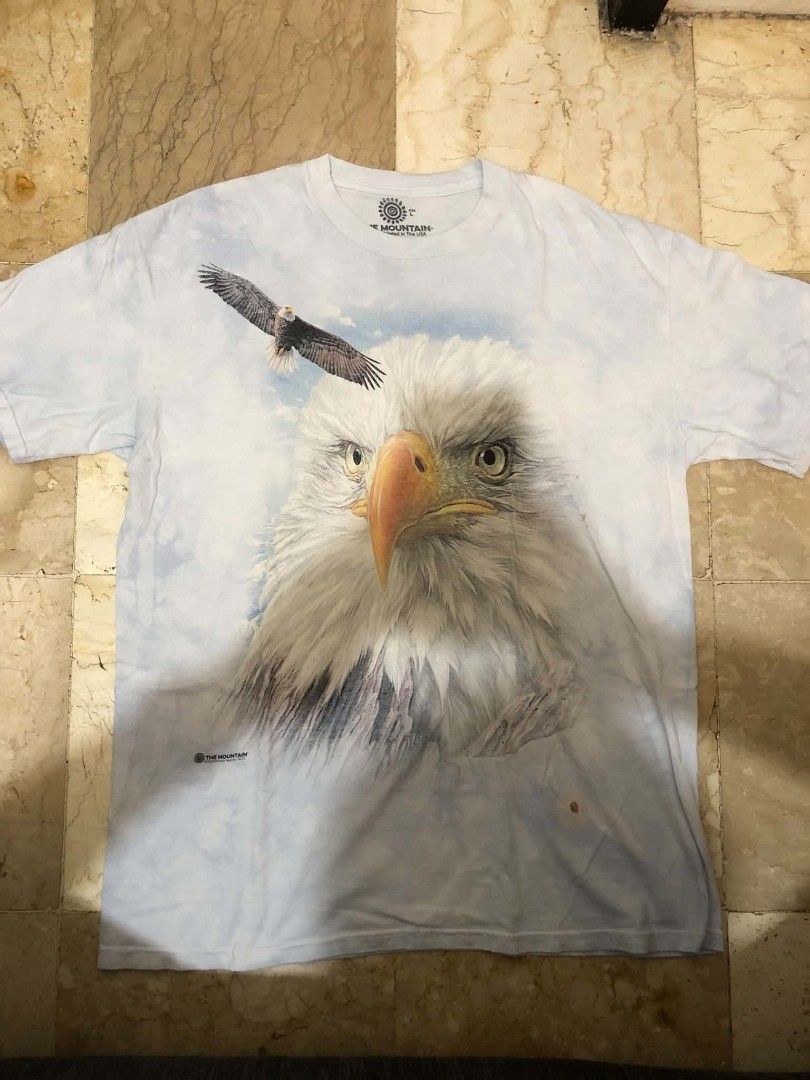 The Mountain Eagle (Category: Tshirts & Polo Shirts ) located in Daraga. Submitted by arkhoholic (Listing ID 1460918766, Image 1). Description: in very good condition Large 22x29 issue washable stain.