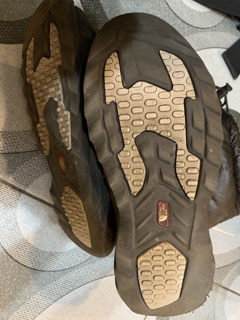 The North Face Puffy Winter Boots (Category: Boots) located in Caloocan City. Submitted by migueljehurvra (Listing ID 1460825156, Image 3). Description: - Brand: The North Face - Color: Brown - Type: Puffy Winter Boots - Features: Great for cold weather, easy slip-on design, excellent sole grip, adjustable drawstring top - Ideal for: Outdoor adventures, keeping warm.