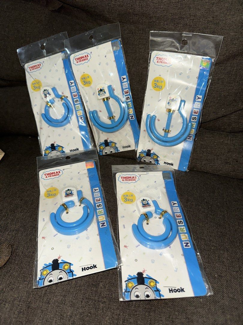 Thomas & Friends Nursery Hooks (3kg Max Load) (Category: Craft Supplies & Tools) located in Manila. Submitted by michaellal91842 (Listing ID 1460844394, Image 1). Description: - Thomas & Friends nursery hooks - Each hook supports up to 3kg - Ideal for hanging bags, coats, and other nursery essentials - Brand new, still in original packaging - A must-have for any Thomas the Tank Engine fan's room.