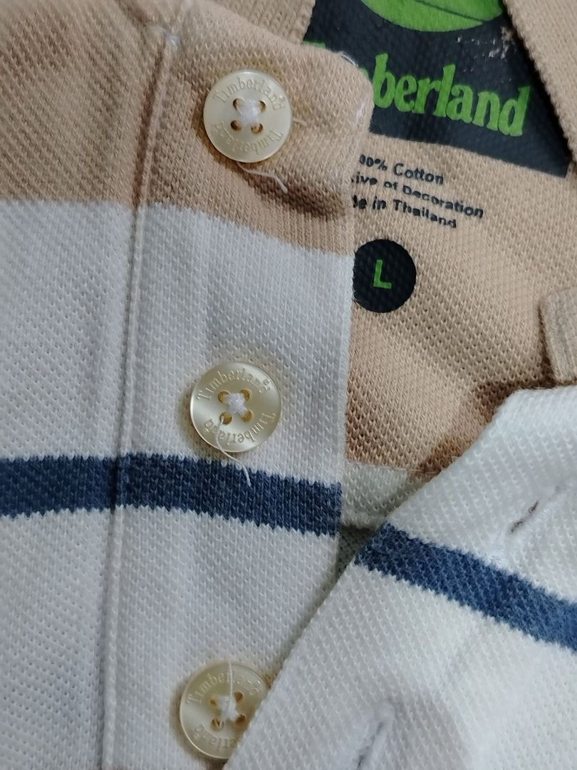 Timberland Polo Shirt (Category: Tshirts & Polo Shirts ) located in Dasmarinas. Submitted by amthriftmixph.2001 (Listing ID 1460734342, Image 3). Description: BRAND: Timberland SIZE: Xl DIMES: 23" Width x 31 - 33" Length CONDITION: 9/10 COLOR RATE: 9/10 TAGS: With Brand Tags ISSUE: Crack print neck tag.