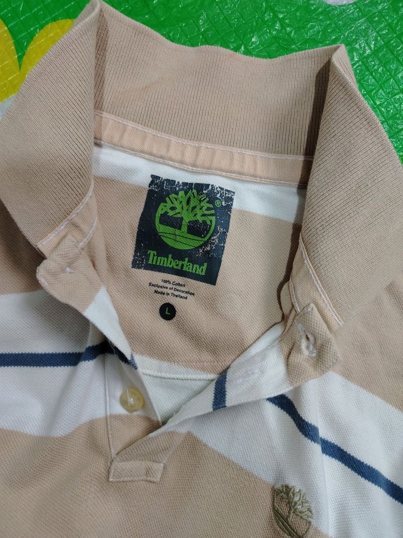 Timberland Polo Shirt (Category: Tshirts & Polo Shirts ) located in Dasmarinas. Submitted by amthriftmixph.2001 (Listing ID 1460734342, Image 2). Description: BRAND: Timberland SIZE: Xl DIMES: 23" Width x 31 - 33" Length CONDITION: 9/10 COLOR RATE: 9/10 TAGS: With Brand Tags ISSUE: Crack print neck tag.