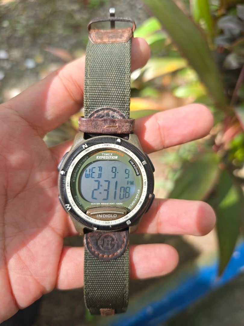 Timex Expedition Digital Compass Watch (Category: Men's Watches) located in Manila. Submitted by timearcph (Listing ID 1460739793, Image 2). Description: - Timex Expedition Watch - Indiglo Backlight - Water Resistant 100m - Green Nylon Strap with Brown Leather Accents - Digital Display (Time, Date, Day) - Ideal for Outdoor Activities & Everyday Wear - Strap shows some signs of wear Price: Php 3500 MEETUPS: • Bacoor,Cavite • Las Pinas City SHIPPIN