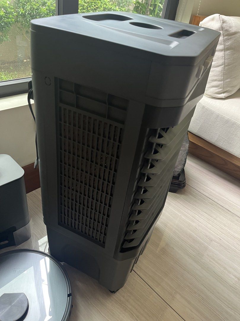 Tixx Air Cooler Fan with Cooling and Swing Function 50L (Category: Air Conditioning and Heating) located in Quezon City. Submitted by ryaneunice76603 (Listing ID 1460725953, Image 3). Description: - Tixx Air Cooler for effective room cooling - Cooling and Swing functions included - Multiple speed settings: Off, Low, Middle, High - Convenient water tank located at the bottom - Proven to work well and keep your room cool - 50L water tank capacity .