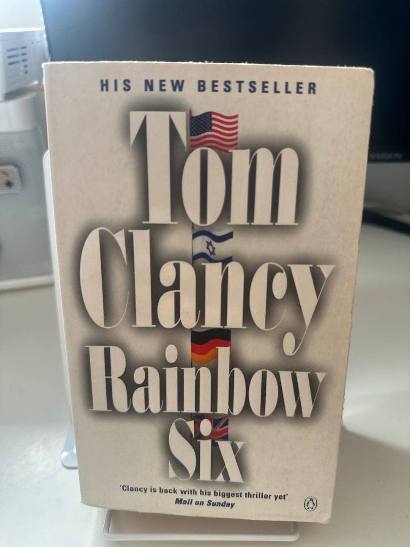 Tom Clancy Rainbow Six Paperback Thriller Novel (Category: Storybooks) located in Imus. Submitted by t0t3fairi3 (Listing ID 1460870661, Image 1). Description: Tom Clancy's Rainbow Six paperback. Thrilling action about an elite task force fighting international terrorism, including hostage situations and a theme park attack. Fast-paced with complex characters. Perfect for suspense and action fans..