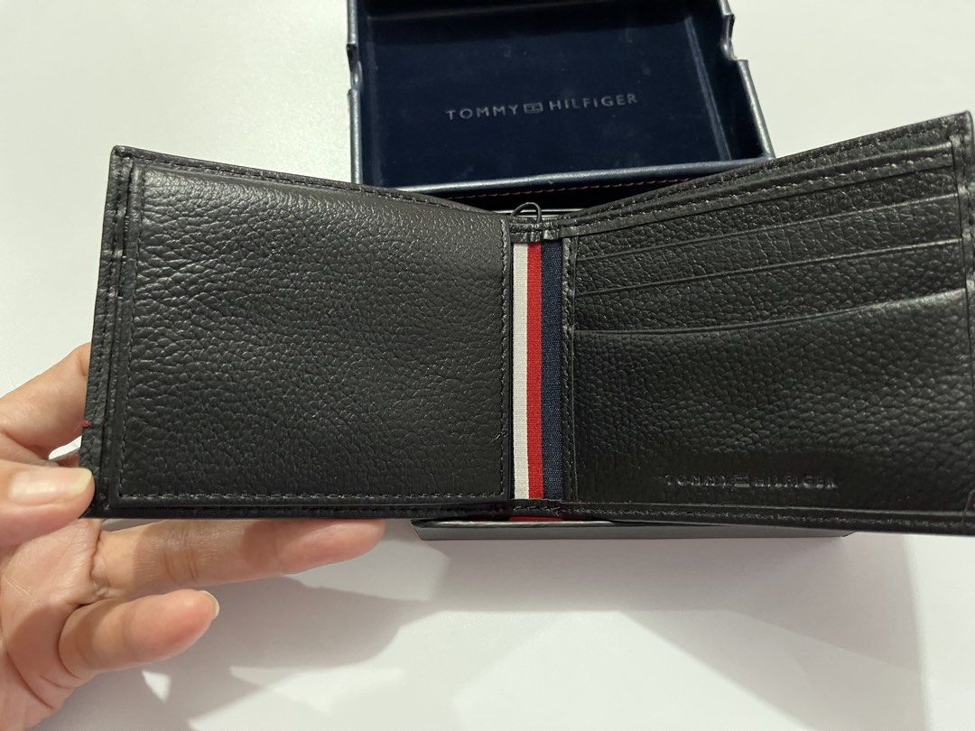Tommy Hilfiger Bifold Wallet (Category: Wallets & Card Holders) located in Santa Rosa. Submitted by ninaparis (Listing ID 1460815868, Image 2). Description: Ofiginal Tommy Hilfiger Bifold Wallet with RFID Protection comes with a box & paper bag perfect pnggift.