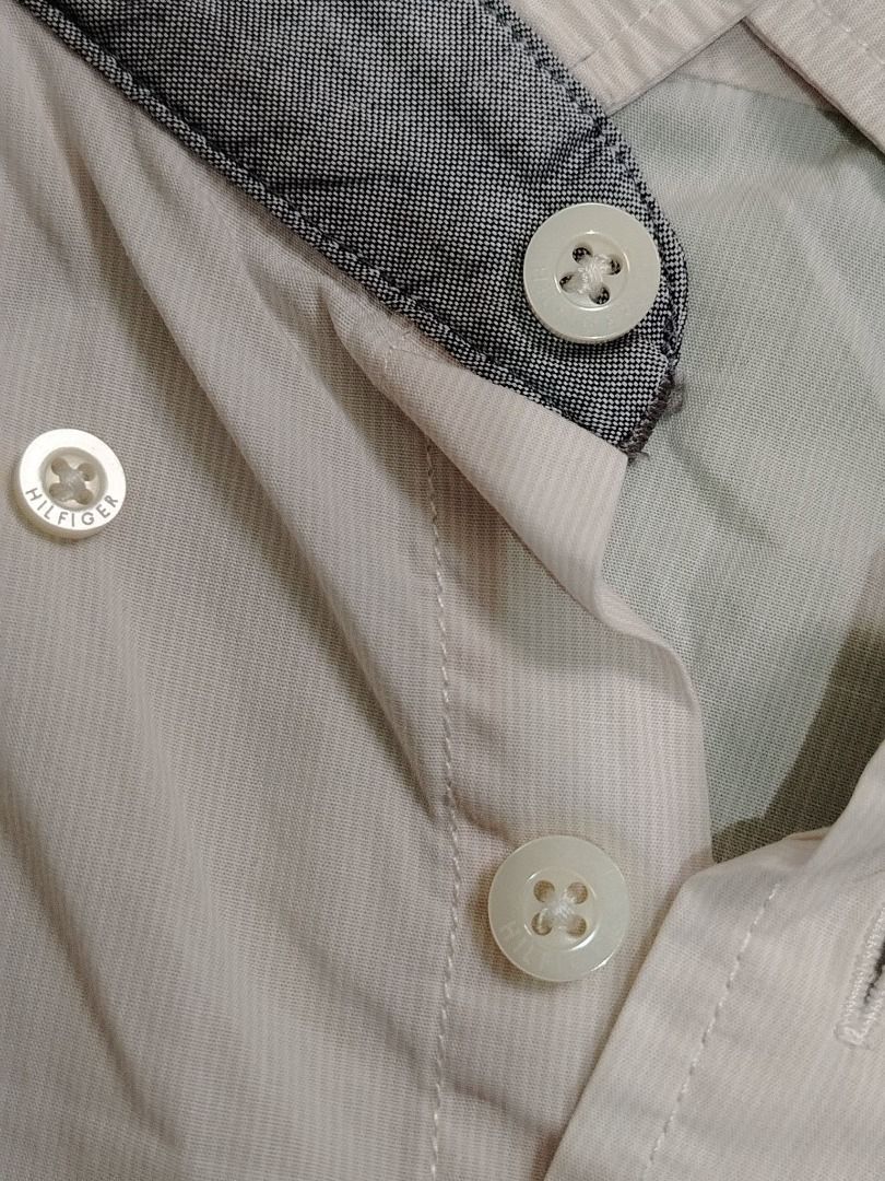 Tommy Hilfiger Buttondown (Category: Tshirts & Polo Shirts ) located in Dasmarinas. Submitted by amthriftmixph.2001 (Listing ID 1460736492, Image 3). Description: BRAND: Tommy Hilfiger SIZE: Large DIMES: 21.5" Width x 27.5" Length CONDITION: 9/10 COLOR RATE: 9/10 TAGS: With Brand Tags ISSUE: Cut wash tag.