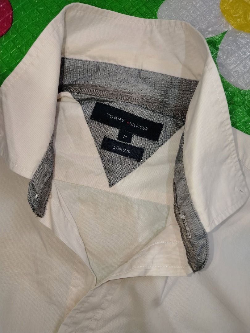 Tommy Hilfiger Buttondown (Category: Tshirts & Polo Shirts ) located in Dasmarinas. Submitted by amthriftmixph.2001 (Listing ID 1460736492, Image 2). Description: BRAND: Tommy Hilfiger SIZE: Large DIMES: 21.5" Width x 27.5" Length CONDITION: 9/10 COLOR RATE: 9/10 TAGS: With Brand Tags ISSUE: Cut wash tag.