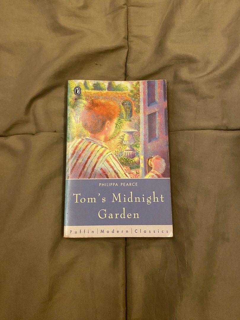 Tom's Midnight Garden by Philippa Pearce Puffin Modern Classics (Category: Storybooks) located in Caloocan City. Submitted by lienzonius (Listing ID 1460734675, Image 1). Description: - Tom's Midnight Garden by Philippa Pearce - Puffin Modern Classics edition - Classic children's novel, perfect for young readers or collectors - Pages are clean and well-preserved - Cover shows minor wear on the edges - Spine is intact and sturdy.