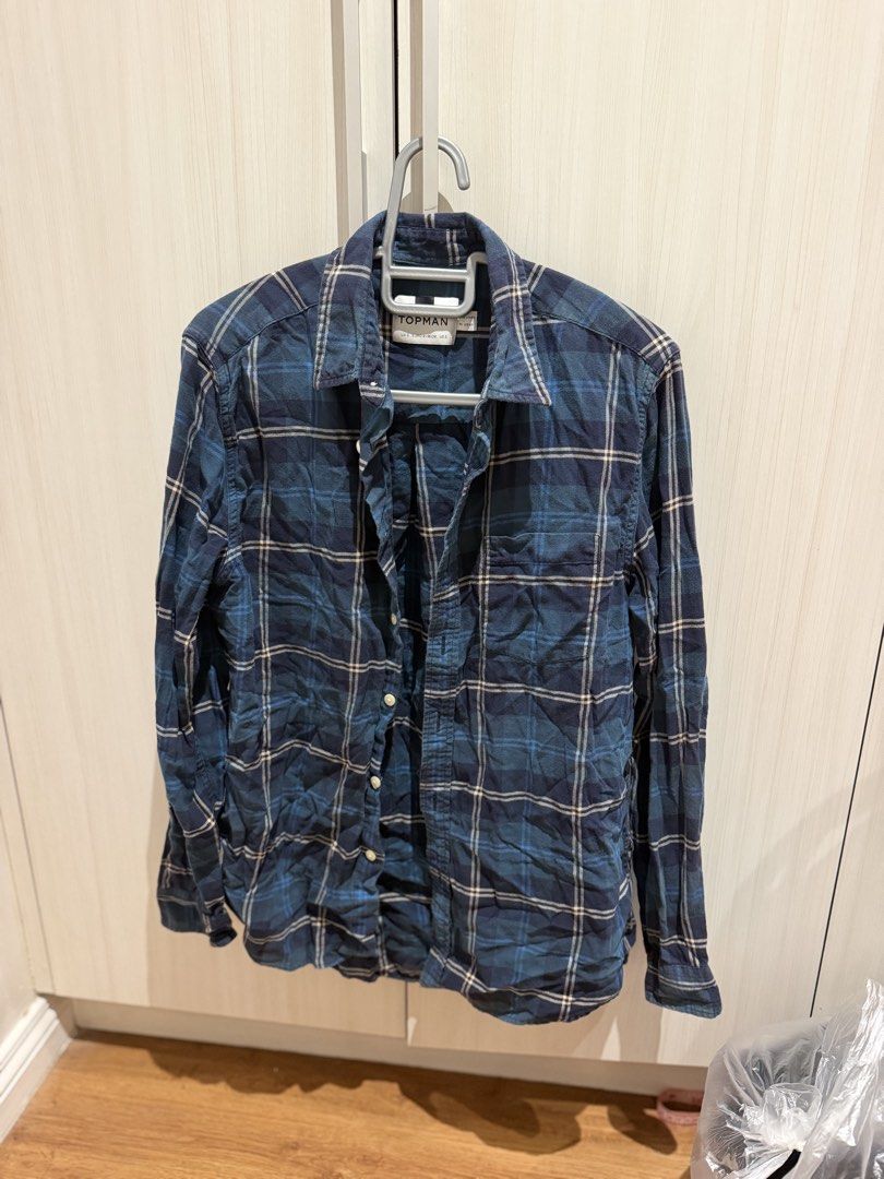 Top man Long sleeves (Category: Formal Shirts) located in Manila. Submitted by alicson001 (Listing ID 1460864518, Image 1). Description: Small on tag .