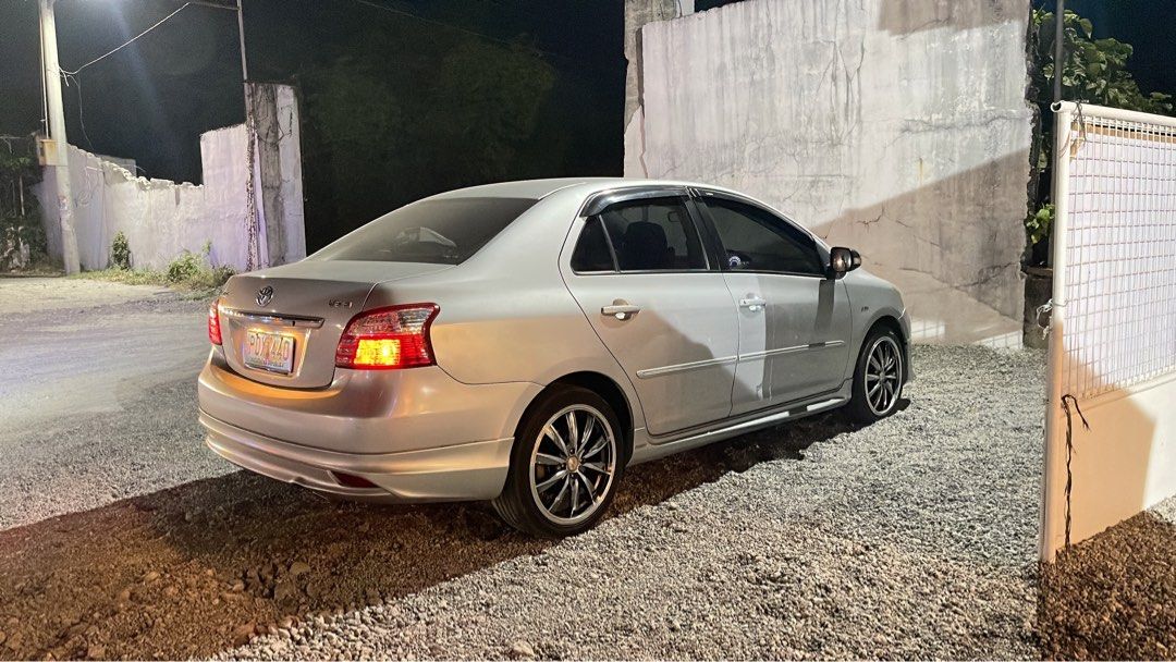 Toyota Vios 1.5 G (M) (Category: Used Cars) located in Manila. Submitted by anastella (Listing ID 1460719321, Image 2). Description: Selling my Personal Car. Vios 1.5G M/T TOP OF THE LINE ✔ Sportivo Body Kits ✔ 17”s Mags ✔ Ice Cold Aircon ✔ 90K Mileage (Not Tampered) ✔ Newly PMS (All fluids & filters) ⚠️ Issue: Minor dents but still presentable (Normal to secondhand car) & 1 Year Unreg due to homebased work 💯 Bring trusted mechanic! Scan & Check