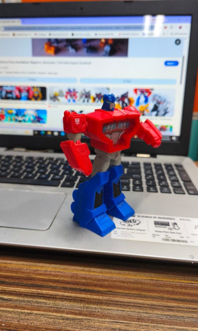 Transformers Optimus Prime Action Figure (Category: Figurines & Statues) located in Caloocan City. Submitted by majehjembo8 (Listing ID 1460745916, Image 3). Description: OPTIMUS PRIME Mcdonalds Cyberverse collection 2019 Iconic Optimus Prime action figure - Classic red and blue color scheme - Perfect for any Transformers fan - Stands independently for easy display - Ideal for both play and display purposes - Looking for a new home!.