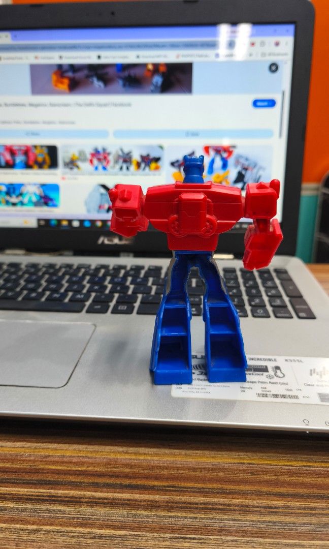Transformers Optimus Prime Action Figure (Category: Figurines & Statues) located in Caloocan City. Submitted by majehjembo8 (Listing ID 1460745916, Image 2). Description: OPTIMUS PRIME Mcdonalds Cyberverse collection 2019 Iconic Optimus Prime action figure - Classic red and blue color scheme - Perfect for any Transformers fan - Stands independently for easy display - Ideal for both play and display purposes - Looking for a new home!.