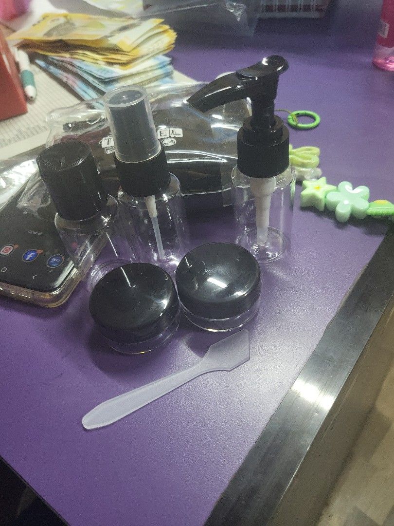 Travel Size Refillable Bottles and Jars Set (Category: Water Bottles & Tumblers) located in Caloocan City. Submitted by lynette1977 (Listing ID 1460814729, Image 2). Description: - Set of travel-sized bottles and jars - Includes spray bottles and screw-top containers - Perfect for toiletries, lotions, or makeup - Comes with a clear zippered pouch - Ideal for packing light on trips - Easy to refill and reuse.