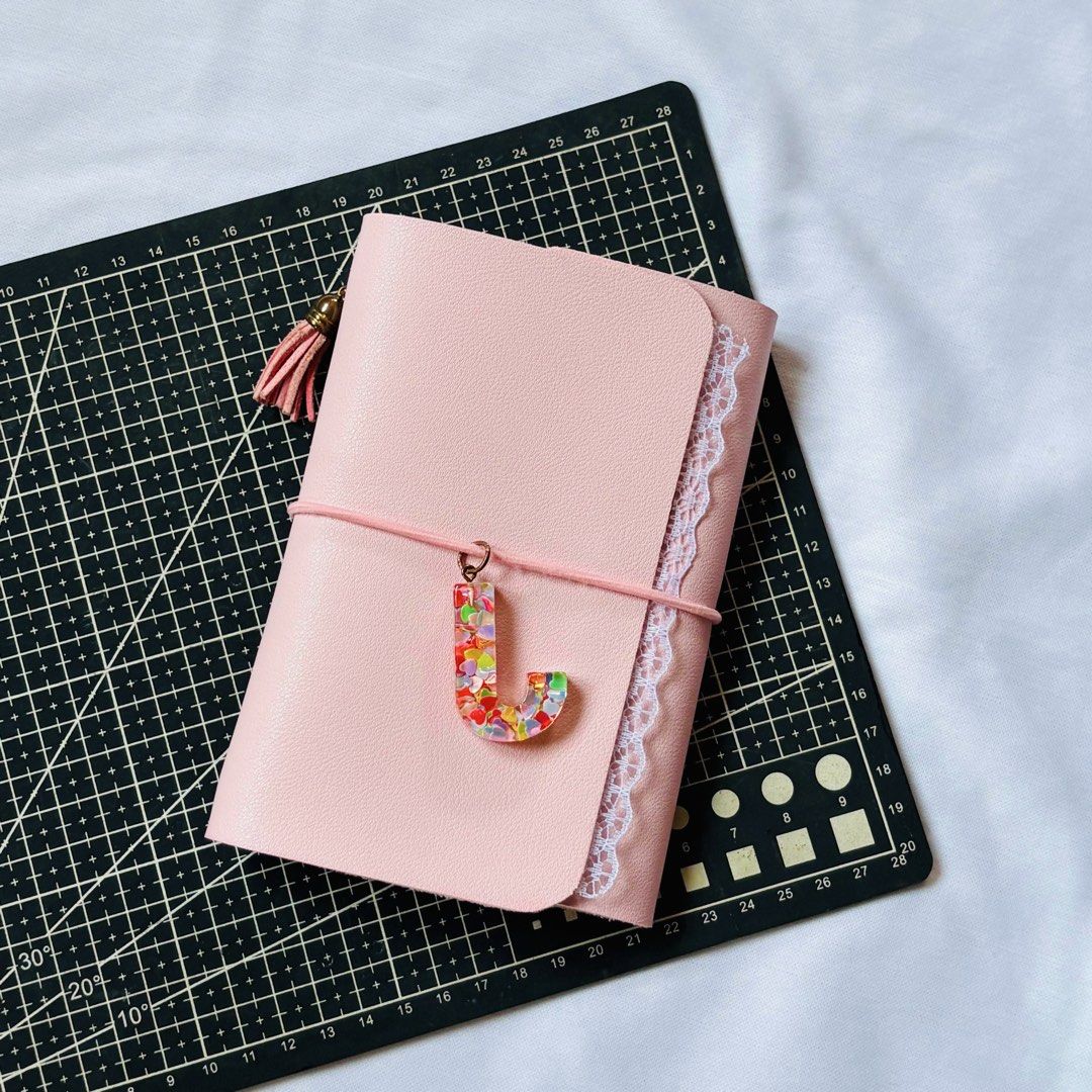 Trifold Journal Leather (Category: Textbooks) located in Plaridel. Submitted by the_twixbar05 (Listing ID 1460736300, Image 2). Description: Trifold Journal Leather ✅A5 Trifold ₱320 Includes two kraft lined notebooks, complemented by two functional planner inserts and finished with two carefully selected charms. ✅A6 Trifold ₱280 Includes two kraft blank notebooks, paired with two functional planner inserts and finished with two carefully selected