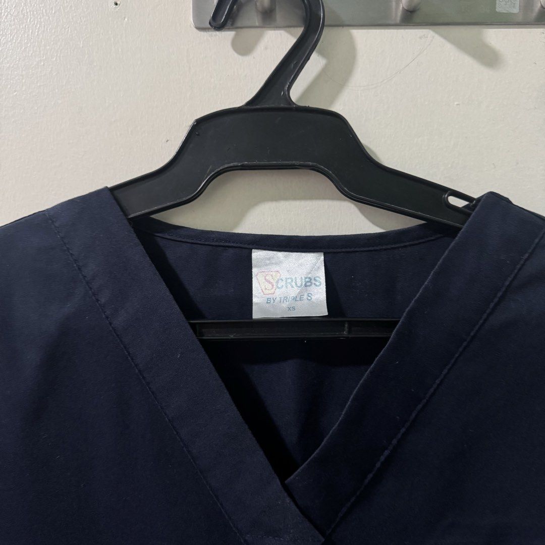 triple S navy blue scrubs set (Category: Sets or Coordinates) located in Pasay City. Submitted by ultzen (Listing ID 1460751578, Image 2). Description: - triple S navy blue scrubs set (w pants) - size xs (fits up to M for a comfy fit) - light and comfy - bought in bambang in 2021 - rfs: decluttering mop: bpi / gcash / maribank mod: j&t / lbc / sdd (manila).