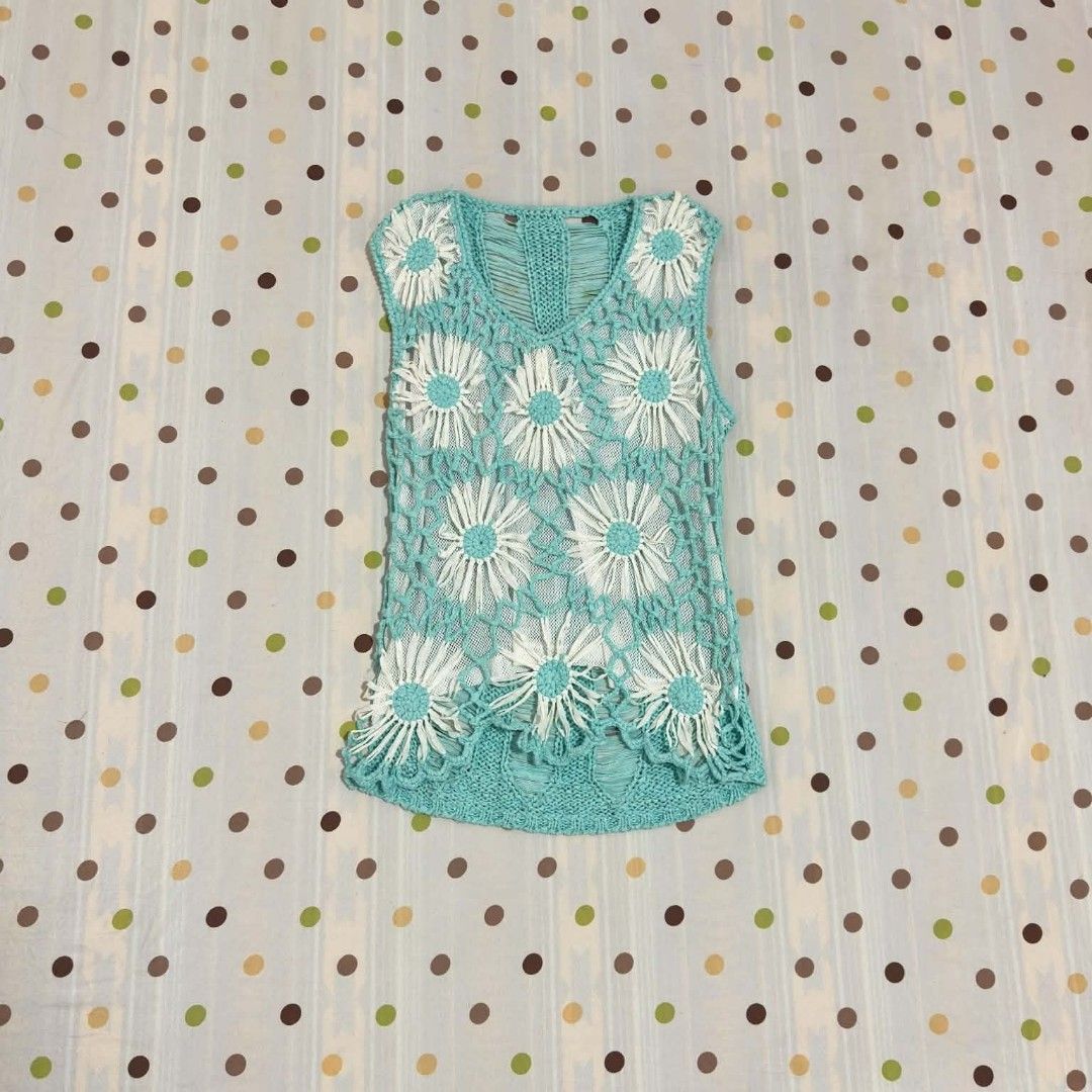 Turquoise Crochet Daisy Tank Top (Category: Sleeveless) located in Manila. Submitted by true.brclo_thing (Listing ID 1460729212, Image 1). Description: - Adorable turquoise crochet tank top - Features charming white daisy appliques all over - Sleeveless design with a flattering V-neck - Versatile for layering or standalone wear - Ideal for festival or beach outfits - size: XS-S.
