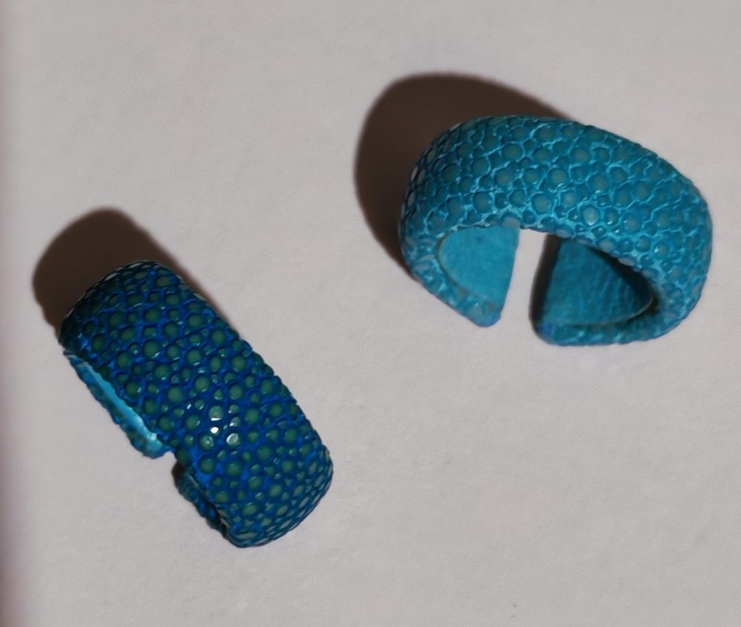 Turquoise Stingray Leather Band Rings (Category: Bracelets) located in Caloocan City. Submitted by mommyella22 (Listing ID 1460735159, Image 2). Description: - Two turquoise rings, Handmade - Unique stingray-like texture - Bright blue inner lining - Eye-catching accessory - Perfect for adding a pop of color - Smooth finish on the inside.