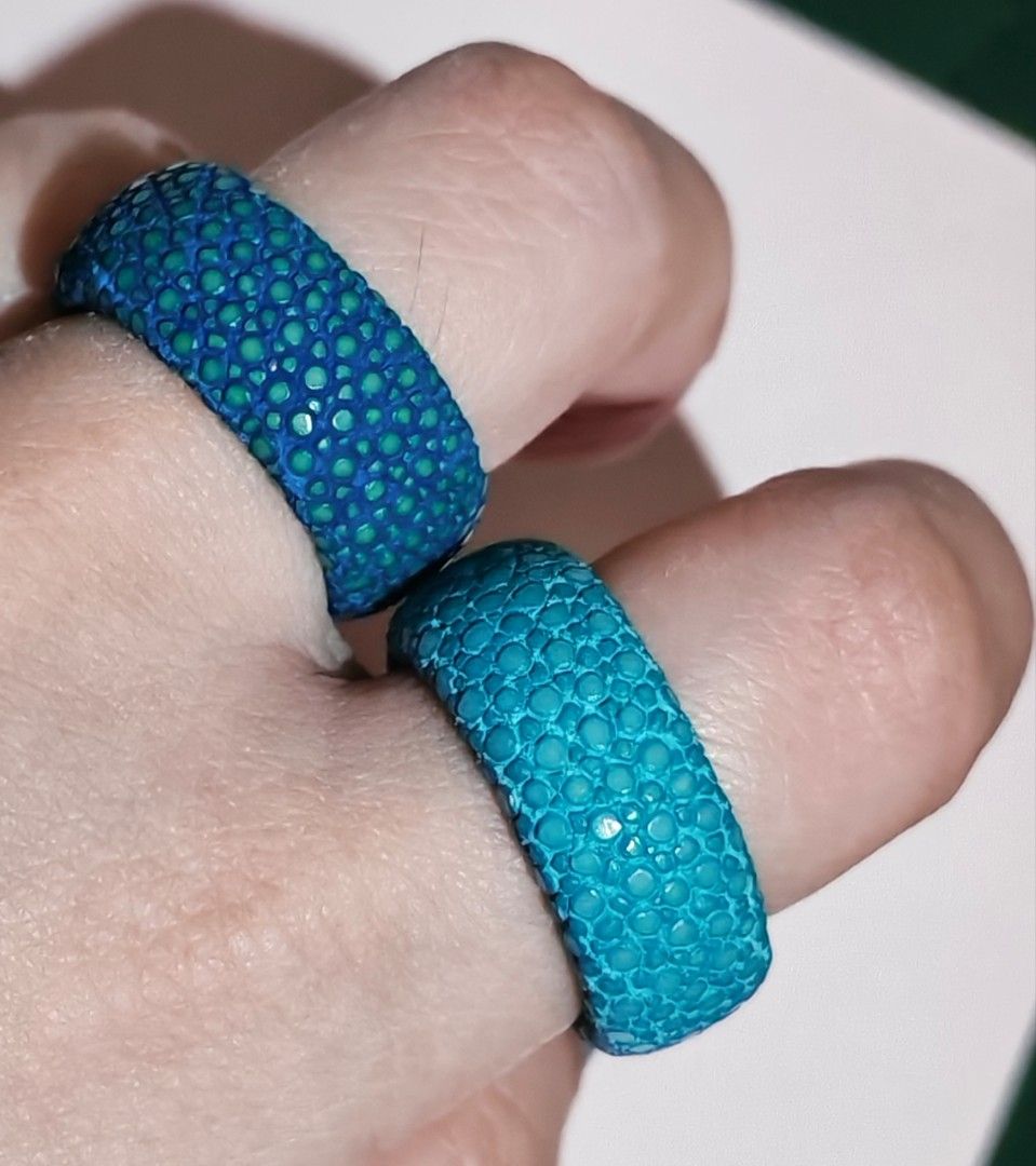 Turquoise Stingray Leather Band Rings (Category: Bracelets) located in Caloocan City. Submitted by mommyella22 (Listing ID 1460735159, Image 3). Description: - Two turquoise rings, Handmade - Unique stingray-like texture - Bright blue inner lining - Eye-catching accessory - Perfect for adding a pop of color - Smooth finish on the inside.