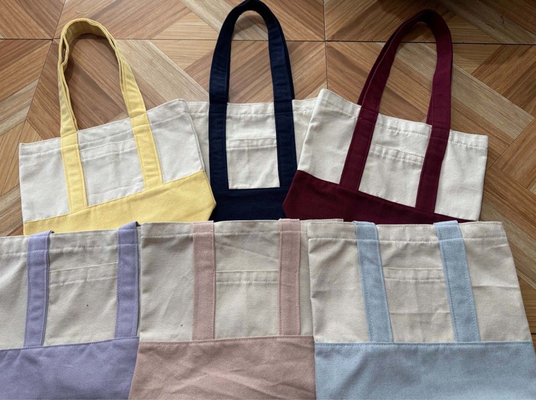 Two-tone Tote Bags (Category: Tote Bags) located in Tarlac. Submitted by tellontanya (Listing ID 1460732364, Image 1). Description: Two-tone Tote Bags 12 x 11 size - ₱170 18 x 15 size - ₱200 Can be bought by piece or bulk. Also open for personalized tote bags & mugs and for any occasions! DM for inquiry/orders!.